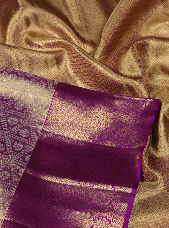 Pure kanchipuram tissue silk saree dual shade of gold and purple with allover zari woven brocade weaves and zari woven border