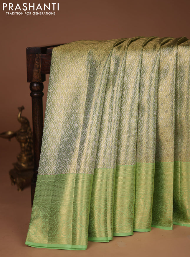 Pure kanchipuram tissue silk saree pista green with allover zari woven brocade weaves and zari woven border