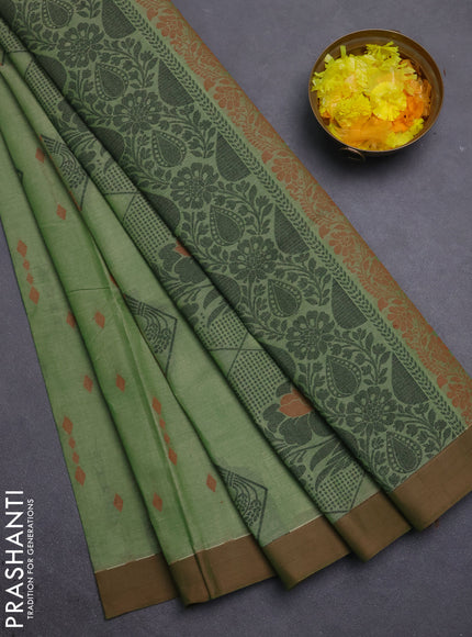 Nithyam cotton saree elaichi green and brown with thread woven geometric buttas and simple border