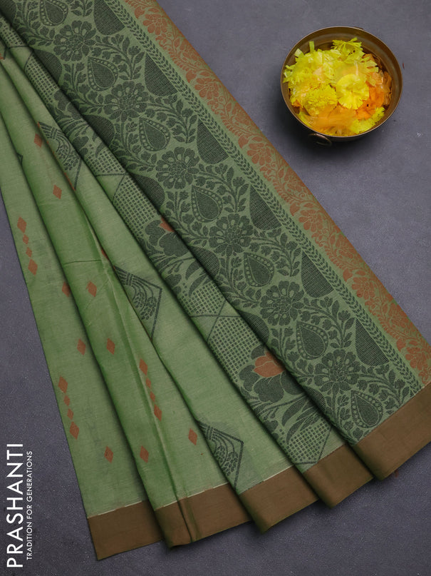 Nithyam cotton saree elaichi green and brown with thread woven geometric buttas and simple border