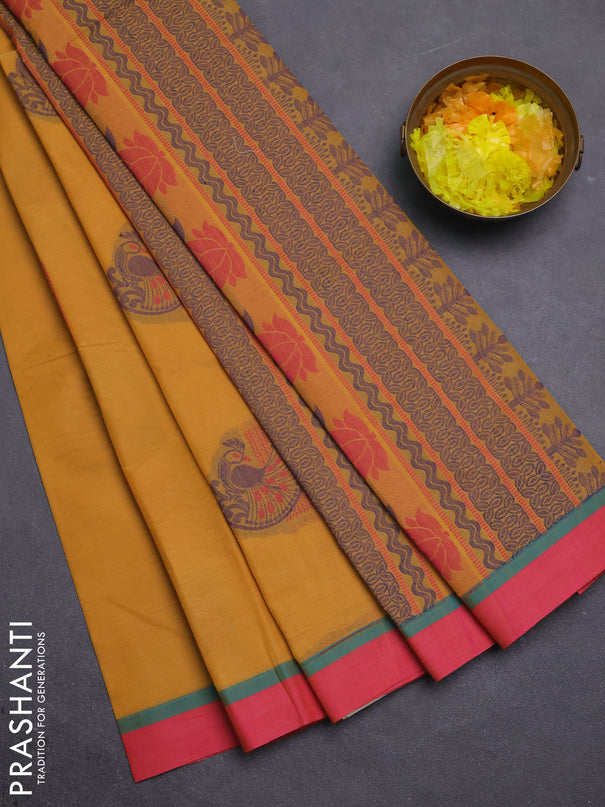 Nithyam cotton saree mustard yellow and pink with thread woven buttas and simple border