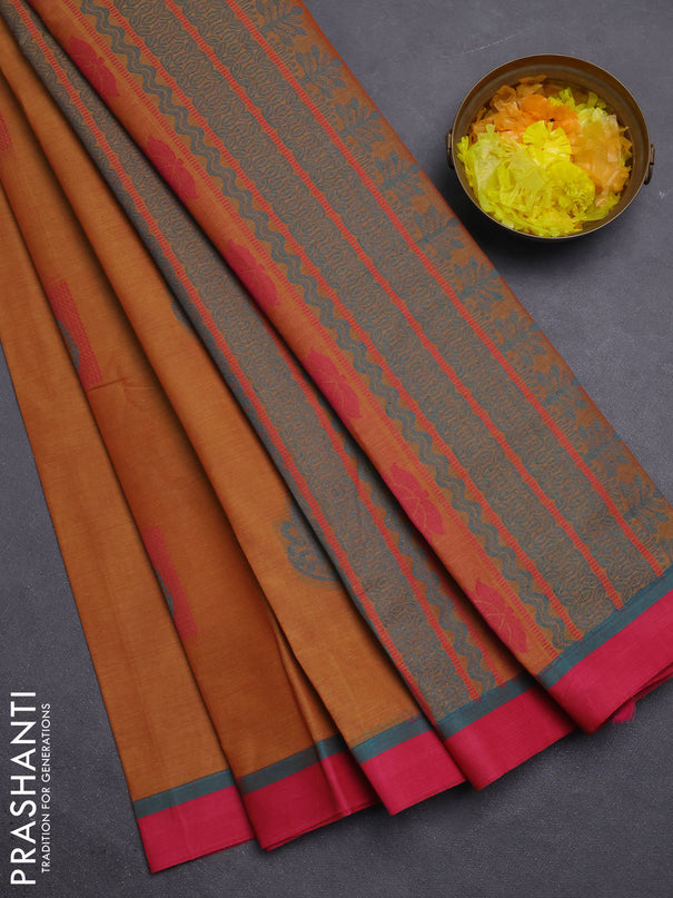 Nithyam cotton saree dark mustard and pink with thread woven buttas and simple border