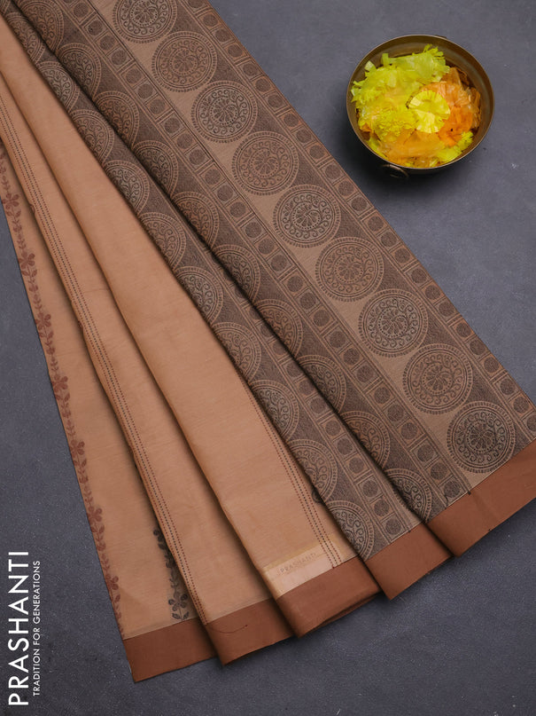 Nithyam cotton saree peach and brown with allover thread weaves & buttas and simple border