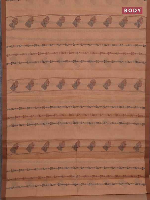 Nithyam cotton saree peach and brown with allover thread weaves & buttas and simple border