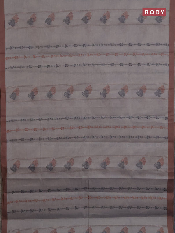 Nithyam cotton saree grey and brown with allover thread weaves & buttas and simple border