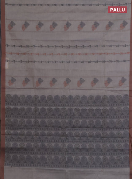 Nithyam cotton saree grey and brown with allover thread weaves & buttas and simple border
