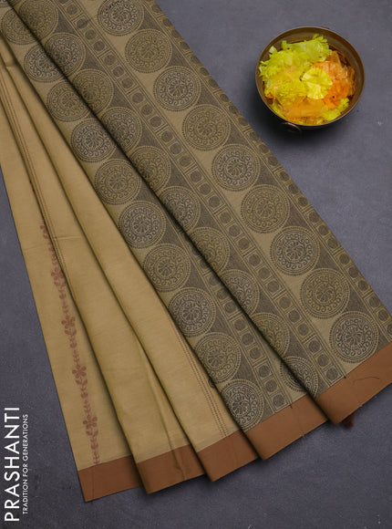 Nithyam cotton saree elaichi green and brown with allover thread weaves & buttas and simple border