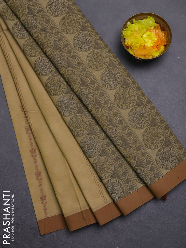 Nithyam cotton saree elaichi green and brown with allover thread weaves & buttas and simple border