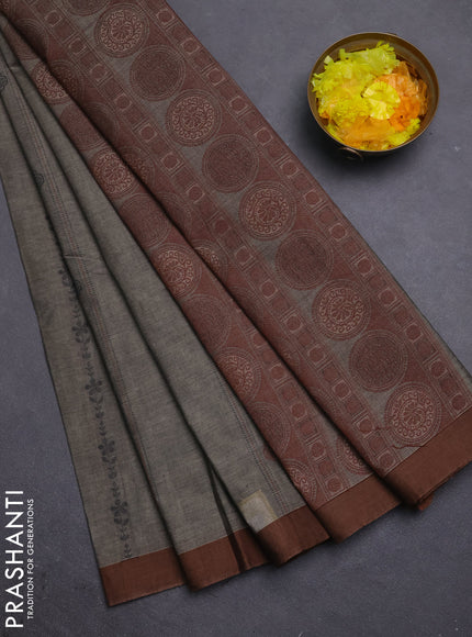Nithyam cotton saree grey shade and brown with allover thread weaves & buttas and simple border
