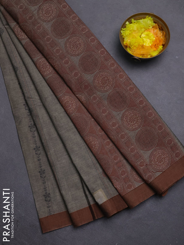 Nithyam cotton saree grey shade and brown with allover thread weaves & buttas and simple border