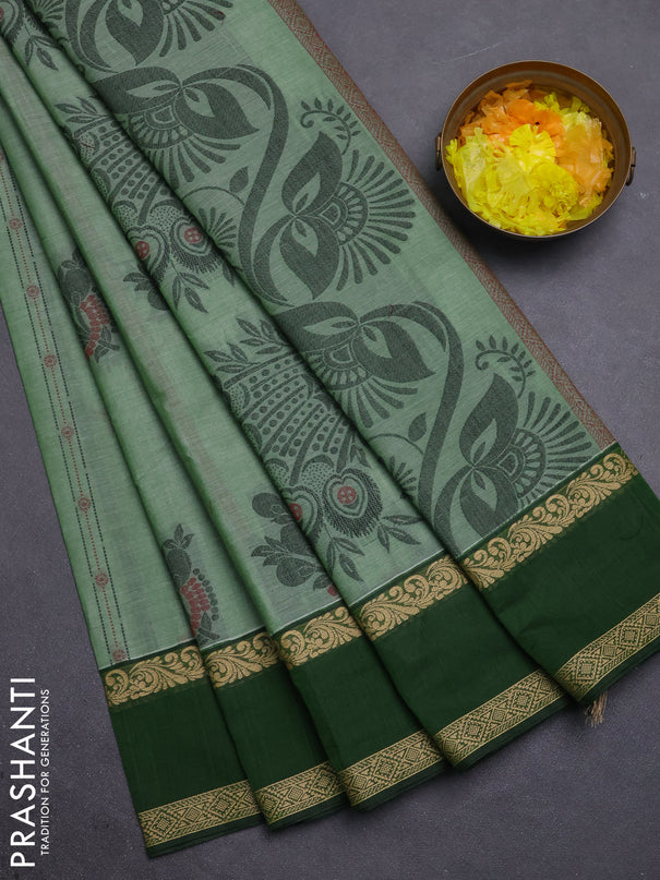 Nithyam cotton saree pastel green and green with allover thread woven stripes pattern & buttas and zari woven simple border