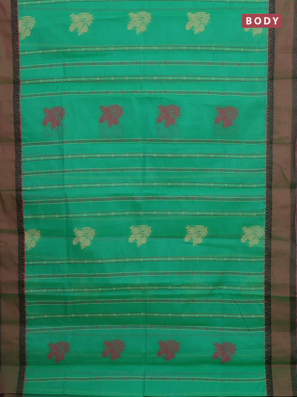 Nithyam cotton saree green and pink with allover thread woven stripes pattern & buttas and rettapet thread woven border