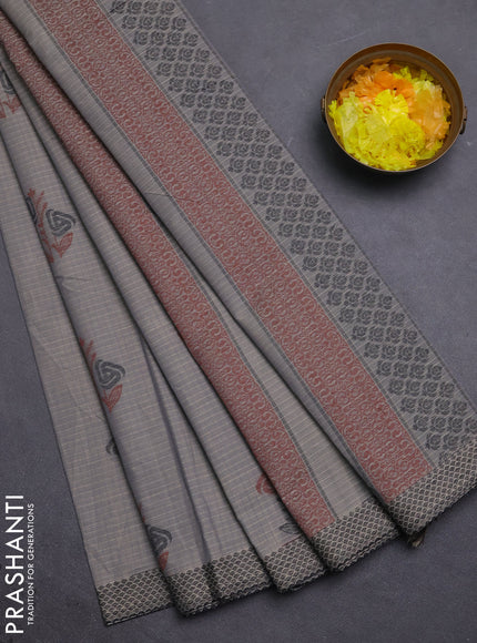 Nithyam cotton saree grey with allover checks pattern & buttas and thread woven border