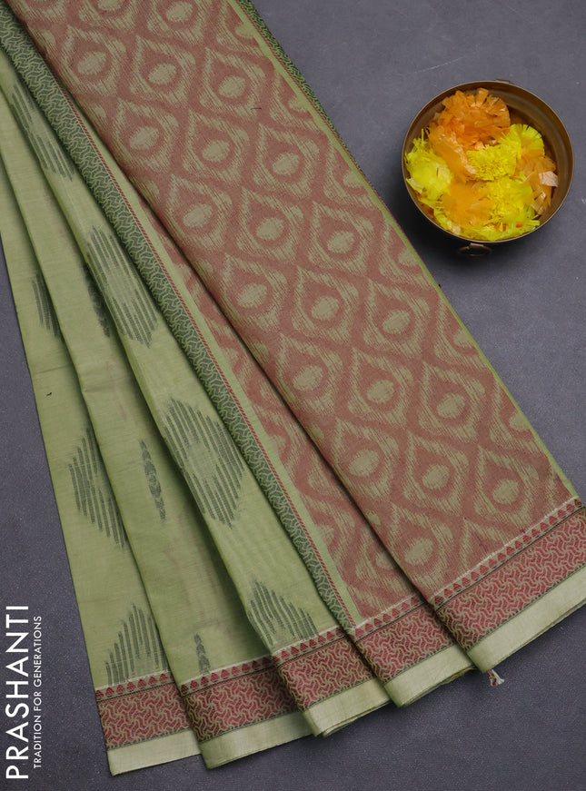 Nithyam cotton saree pista green with allover thread woven buttas and thread woven border