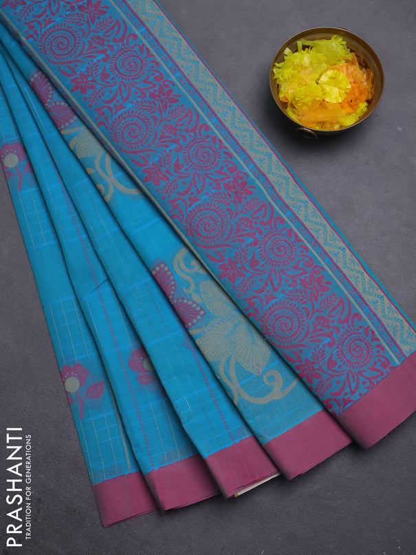 Nithyam cotton saree teal blue and pink with allover thread woven stripes pattern & floral buttas and simple border
