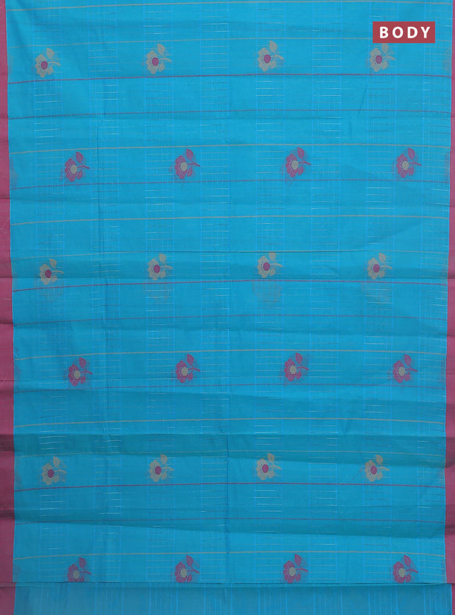 Nithyam cotton saree teal blue and pink with allover thread woven stripes pattern & floral buttas and simple border