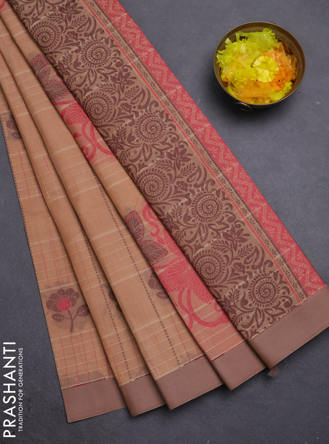 Nithyam cotton saree peach shade and sandal with allover thread woven stripes pattern & floral buttas and simple border