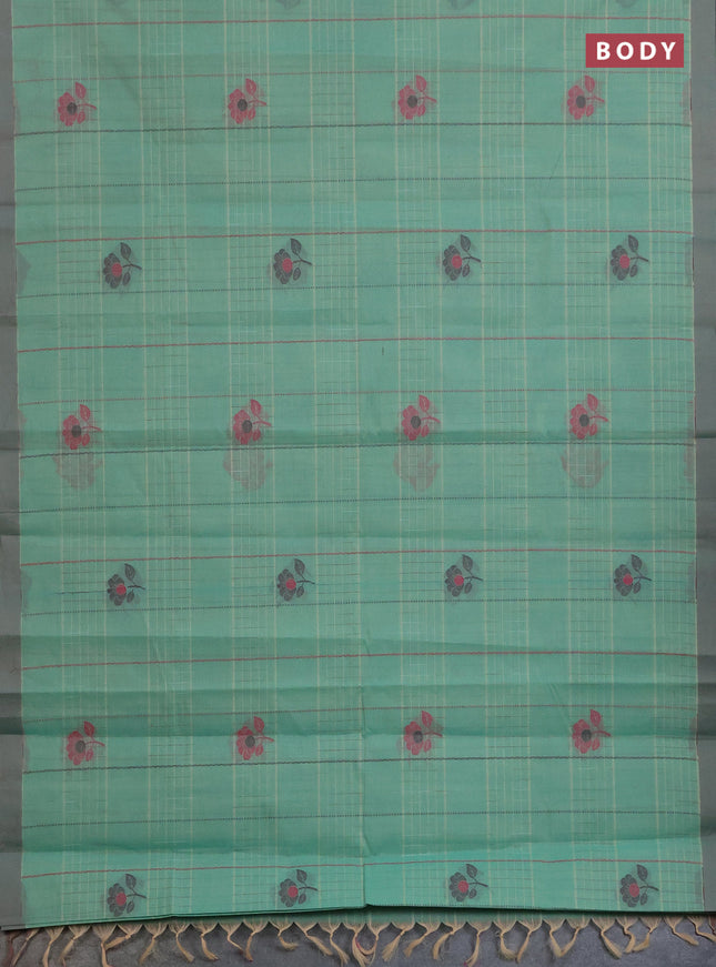 Nithyam cotton saree teal green and sandal with allover thread woven stripes pattern & floral buttas and simple border