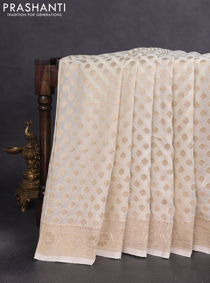 Banarasi semi georgette saree off white with allover zari woven buttas and zari woven border