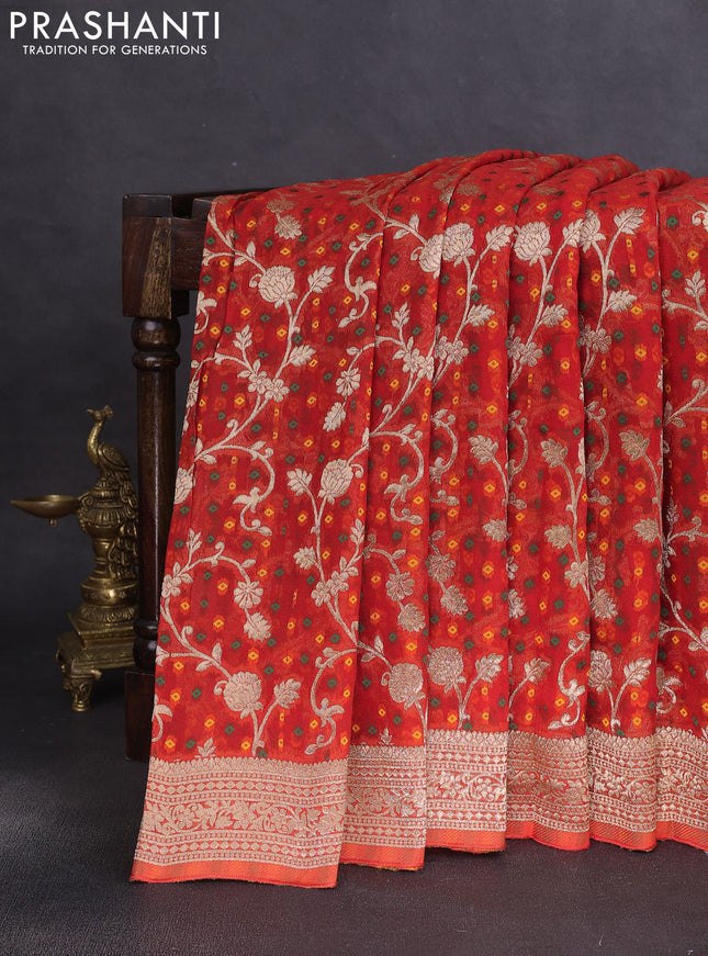 Banarasi semi georgette saree orange with allover zari weaves & bandhani thread buttas and zari woven border