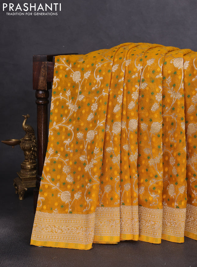 Banarasi semi georgette saree yellow with allover zari weaves & bandhani thread buttas and zari woven border