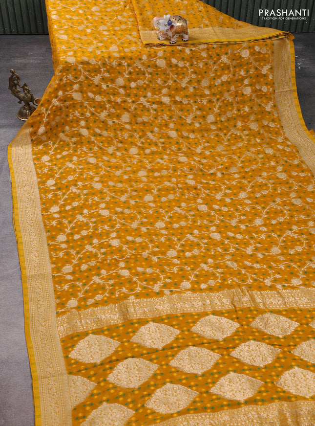 Banarasi semi georgette saree yellow with allover zari weaves & bandhani thread buttas and zari woven border