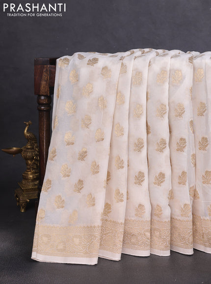 Banarasi semi georgette saree off white with allover floral zari buttas and zari woven border