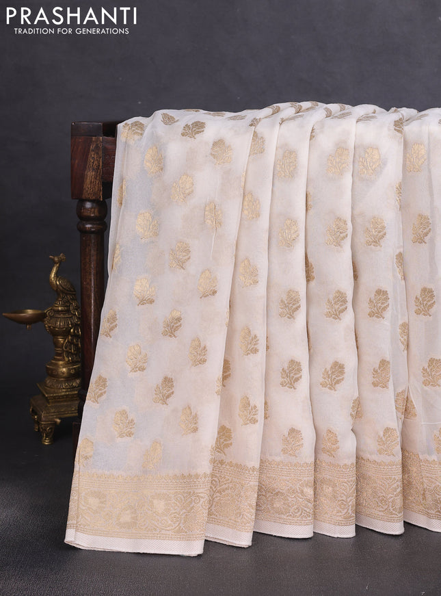 Banarasi semi georgette saree off white with allover floral zari buttas and zari woven border