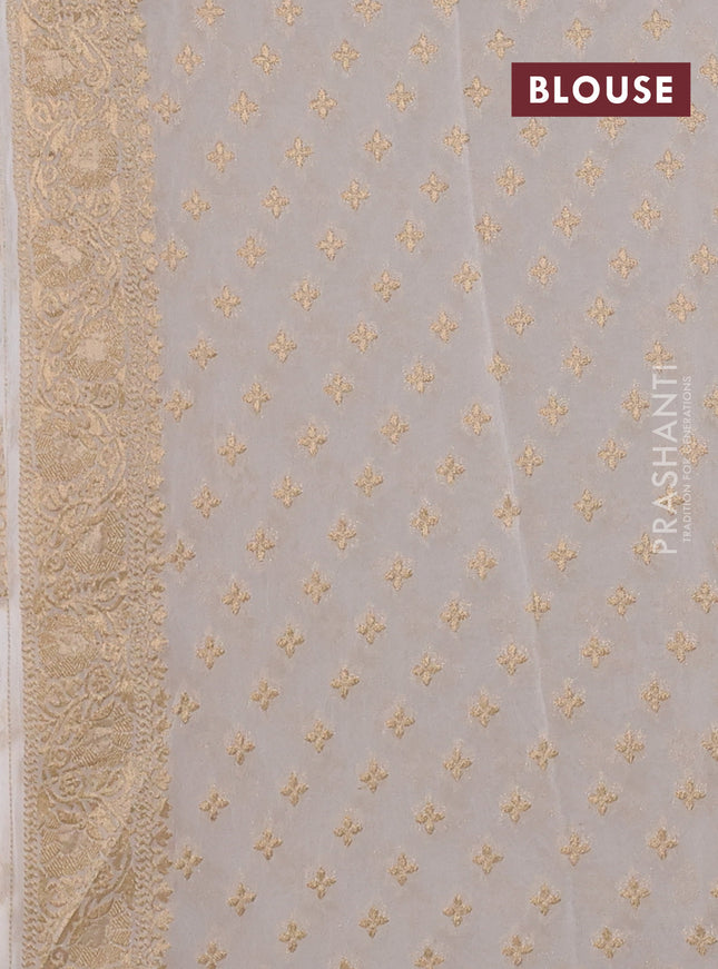 Banarasi semi georgette saree off white with allover floral zari buttas and zari woven border