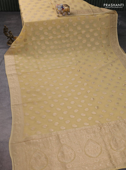 Banarasi semi georgette saree beige with allover floral zari buttas and zari woven border
