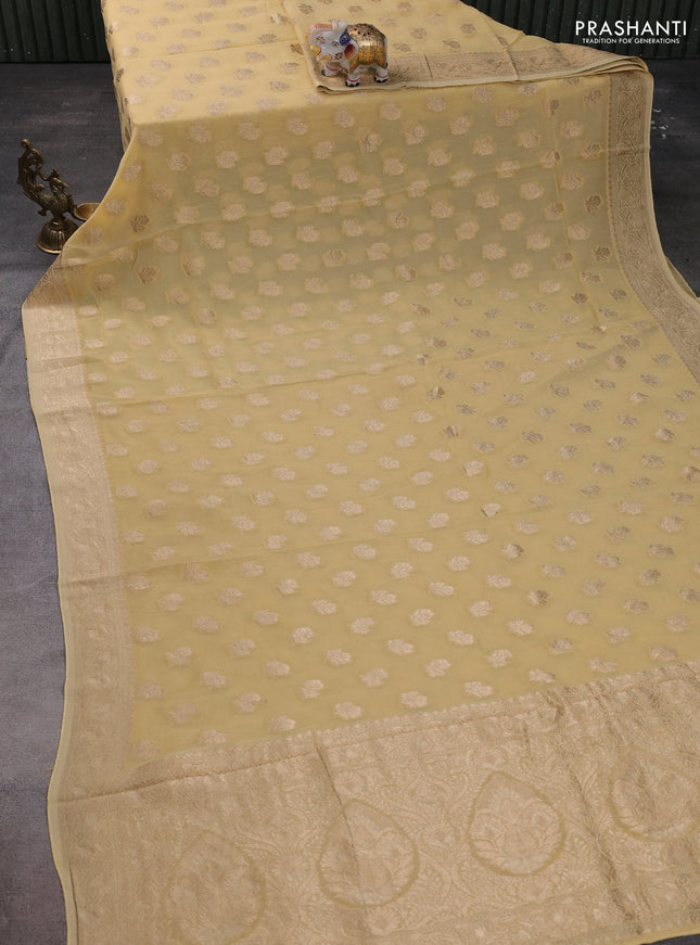 Banarasi semi georgette saree beige with allover floral zari buttas and zari woven border