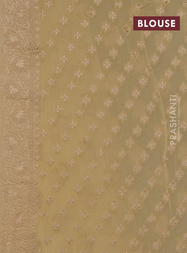 Banarasi semi georgette saree beige with allover floral zari buttas and zari woven border