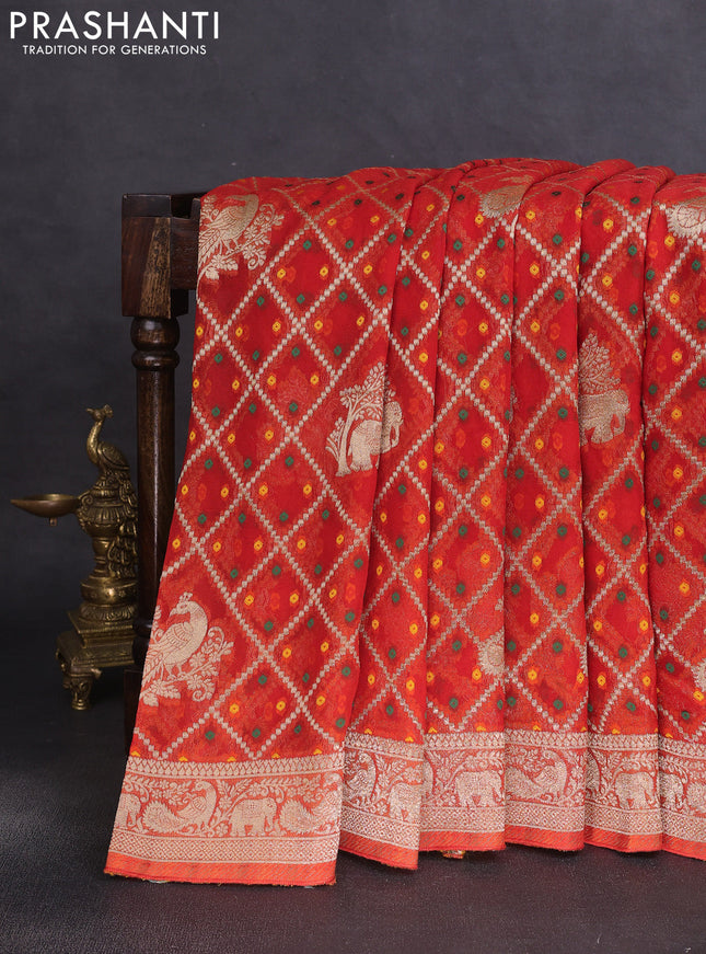 Banarasi semi georgette saree orange with allover zari weaves & bandhani thread buttas and zari woven border