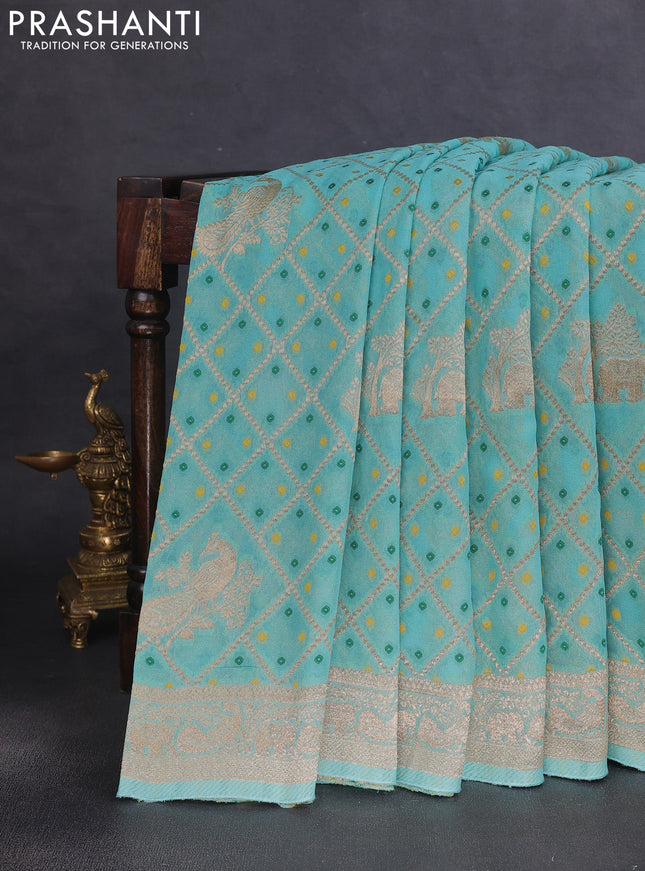Banarasi semi georgette saree teal green with allover zari weaves & bandhani thread buttas and zari woven border