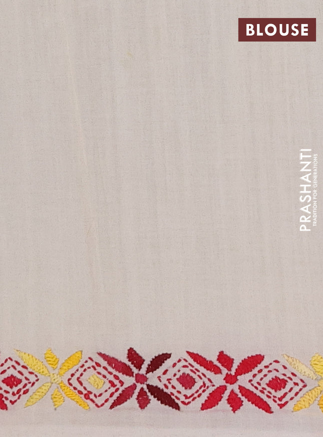 Ikat cotton saree black and cream with allover ikat woven buttas and kantha stitch work pallu