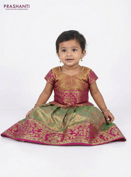 Pure silk tissue unstitched kids lehenga dual shade of pastel green and magenta pink with allover zari woven brocade weaves and rich zari woven border