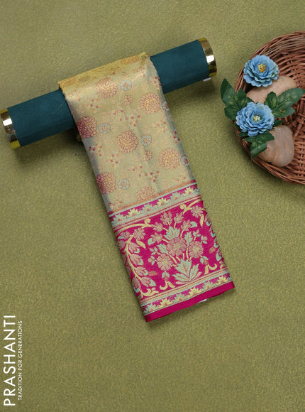 Pure silk tissue unstitched kids lehenga dual shade of pastel green and magenta pink with allover zari woven brocade weaves and rich zari woven border