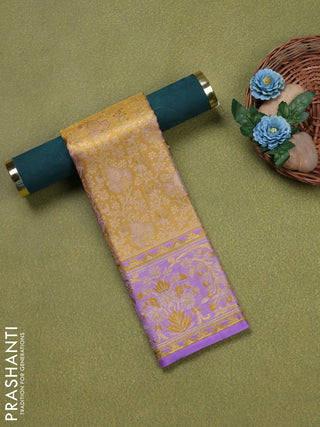 Pure silk tissue unstitched kids lehenga gold and lavender with allover zari woven brocade weaves and rich zari woven border