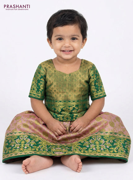 Pure silk tissue unstitched kids lehenga mild peach and green with allover zari woven brocade weaves and rich zari woven border