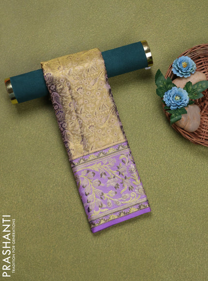 Pure silk tissue unstitched kids lehenga gold and lavender with allover zari woven brocade weaves and rich zari woven border