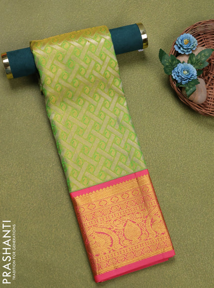 Pure silk tissue unstitched kids lehenga light green and peach pink with allover zari woven brocade weaves and rich zari woven border