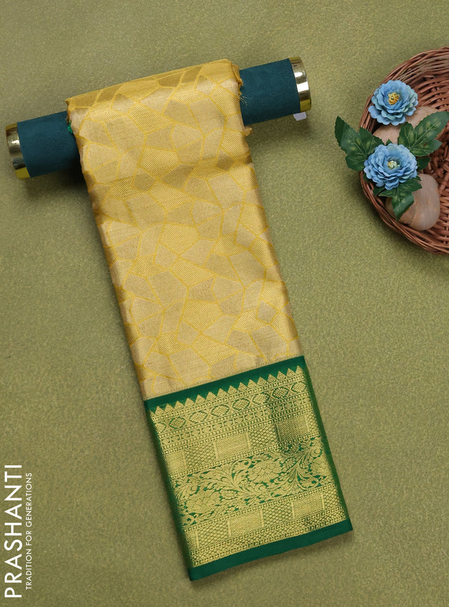 Pure silk tissue unstitched kids lehenga gold and green with allover zari woven brocade weaves and rich zari woven border