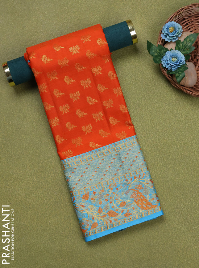 Pure silk unstitched kids lehenga orange and teal blue with allover zari woven buttas and rich zari woven border
