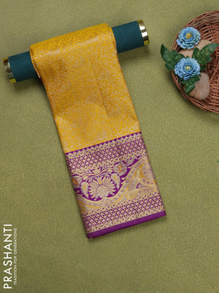 Pure silk unstitched kids lehenga yellow and purple with allover silver zari woven brocade weaves and rich zari woven border