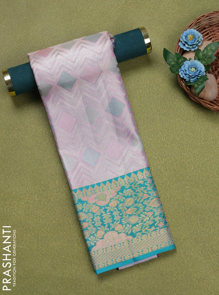 Pure silk tissue unstitched kids lehenga baby pink and teal green with allover silver zari woven brocade weaves and rich zari woven border