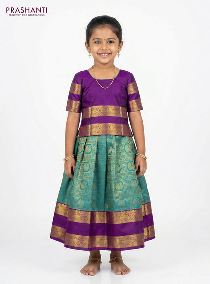 Pure silk unstitched kids lehenga teal green and purple with allover zari woven brocade weaves and rettapet zari woven border