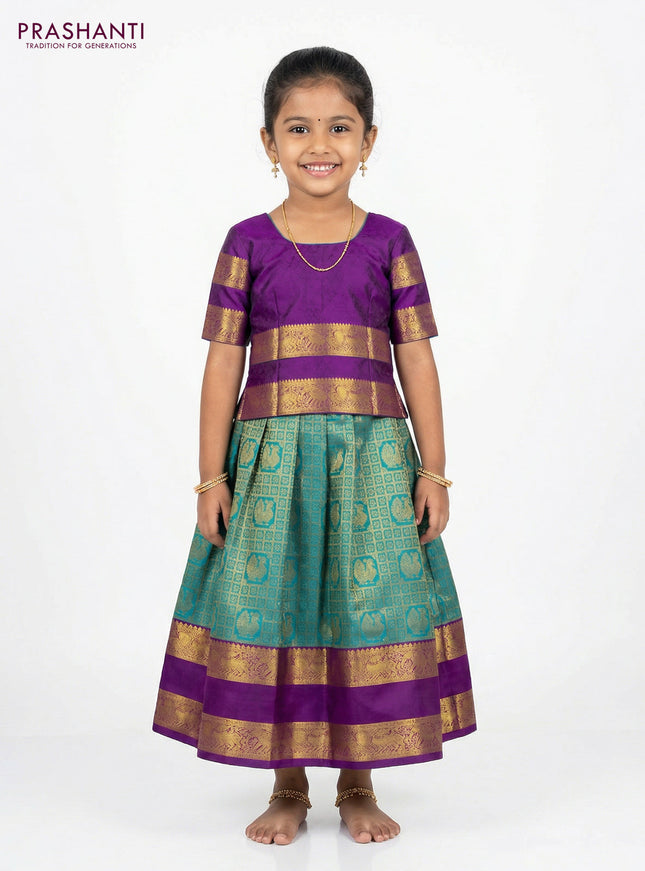 Pure silk unstitched kids lehenga teal green and purple with allover zari woven brocade weaves and rettapet zari woven border