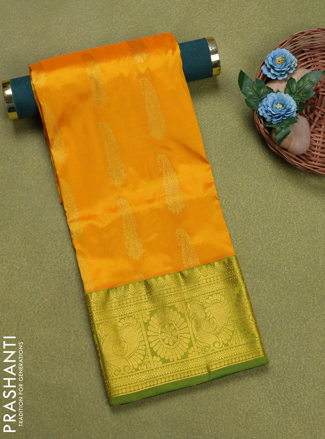 Pure silk unstitched kids lehenga mango yellow and green with paisley zari woven buttas and rich zari woven border
