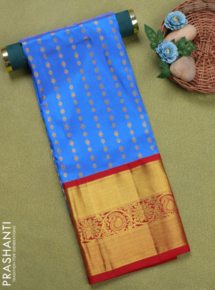 Pure silk unstitched kids lehenga blue and red with allover zari woven buttas and long zari woven border