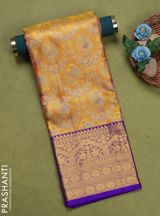 Pure silk tissue unstitched kids lehenga dual shade of orange and blue with allover zari woven brocade weaves and rich zari woven border